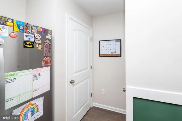 a shelf with books and knick knacks on it