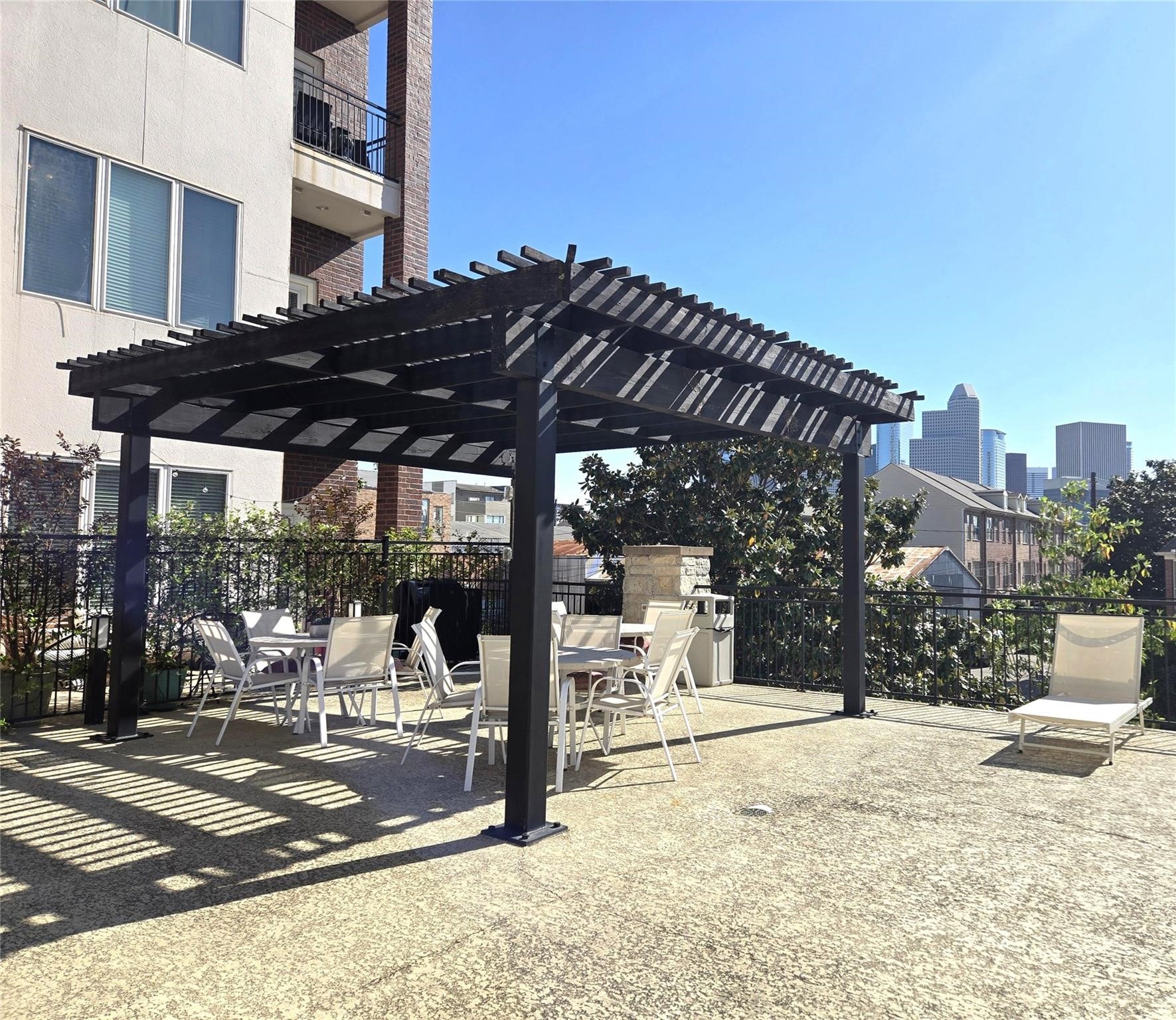 1900 Genesee Street, Unit 207 Houston, TX 77006 - Photo 44 of 50 The gazebo is perfect to enjoy al fresco meals or taking in the breathtaking Downtown views.