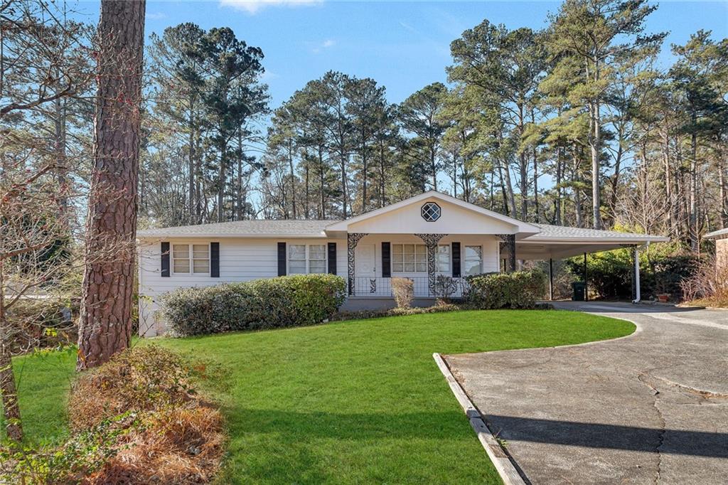 6500 Pisgah Road Southwest Austell, GA 30168 - Photo 1 of 1 a front view of a house with garden