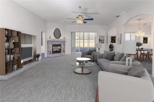 a kitchen with stainless steel appliances granite countertop a refrigerator a sink and a stove
