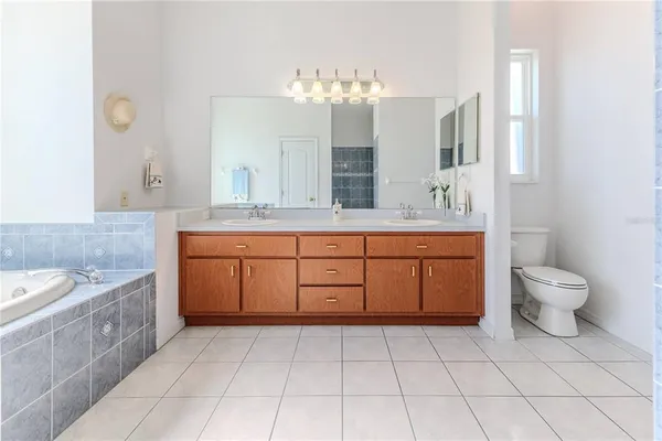 a aerial view of a house with a lake view