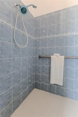 an aerial view of a houses with a lake view