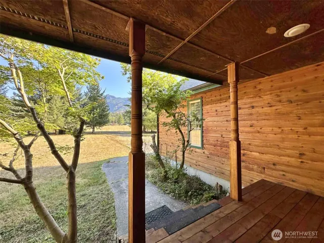 a view of a door with a tree