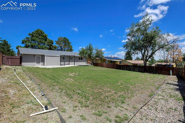 6799 Mission Road Colorado Springs, CO 80915 - Photo 16 of 19 HUGE fenced in backyard