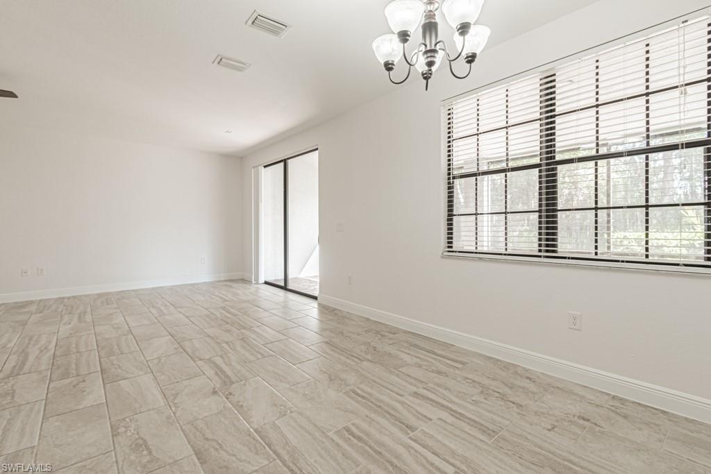 15496 Summit Pl Circle, Unit 115 Naples, FL 34119 - Photo 11 of 50 View from Dining Area to Living Room