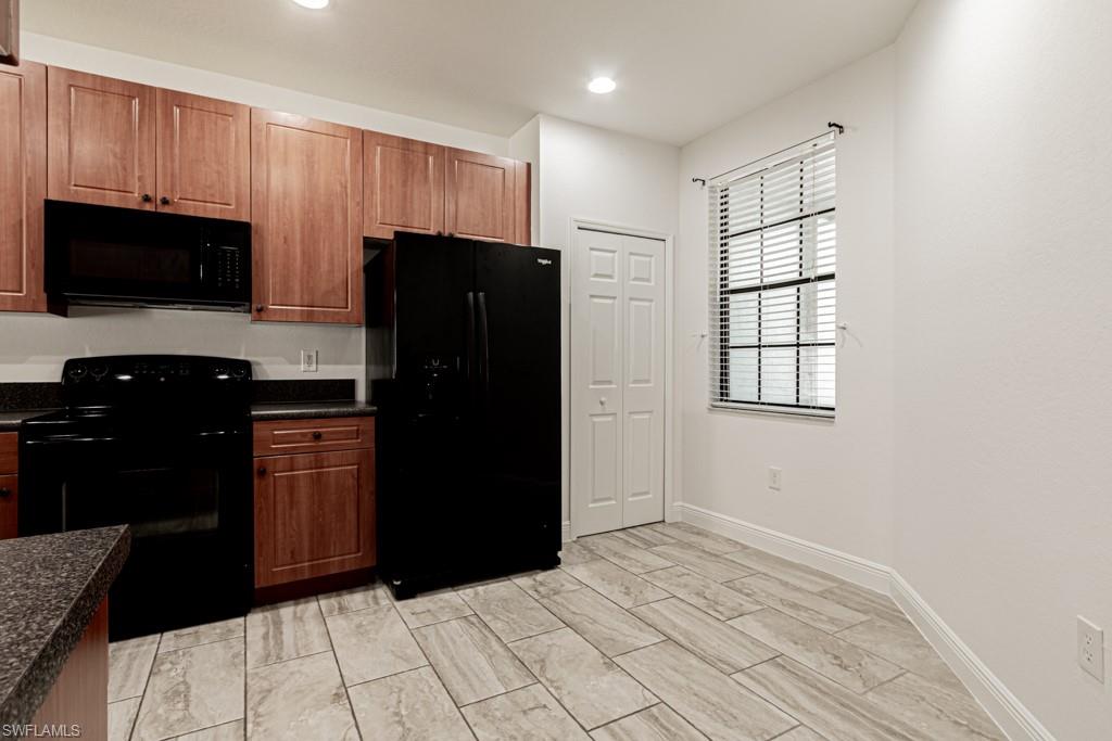 15496 Summit Pl Circle, Unit 115 Naples, FL 34119 - Photo 15 of 50 Room for a small eat-in table