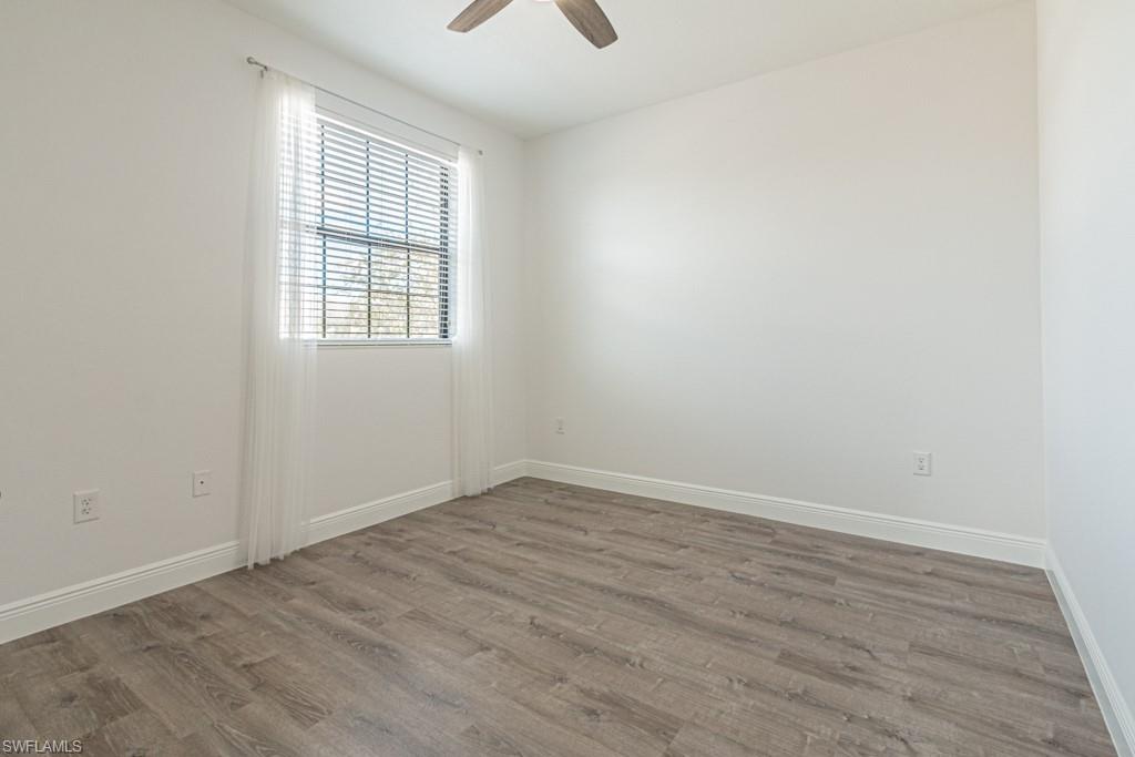 15496 Summit Pl Circle, Unit 115 Naples, FL 34119 - Photo 45 of 50 Guest Bedroom