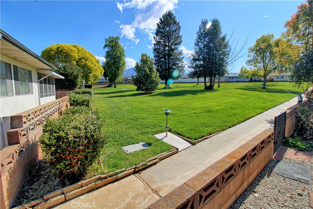 34464 Avena Way Yucaipa, CA 92399 - Photo 17 of 17 a view of a garden with an outdoor space