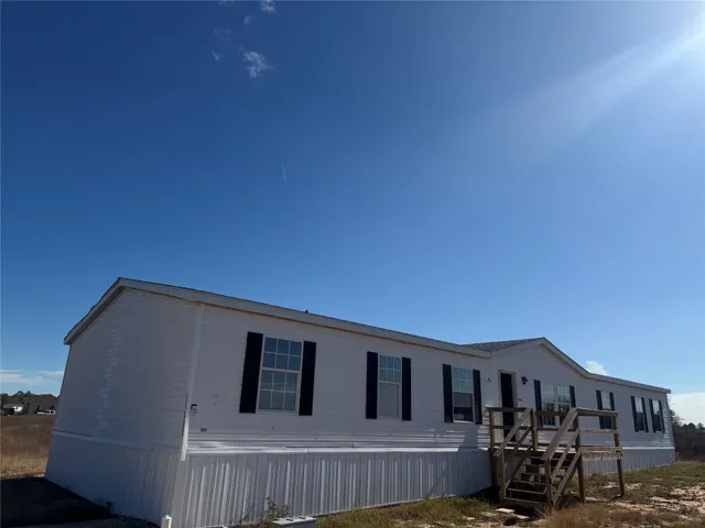 a house view with a outdoor space