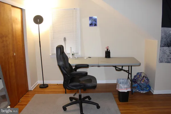 a view of workspace and wooden floor