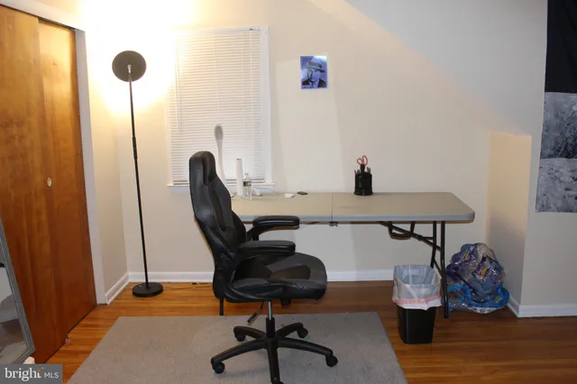 a view of workspace and wooden floor