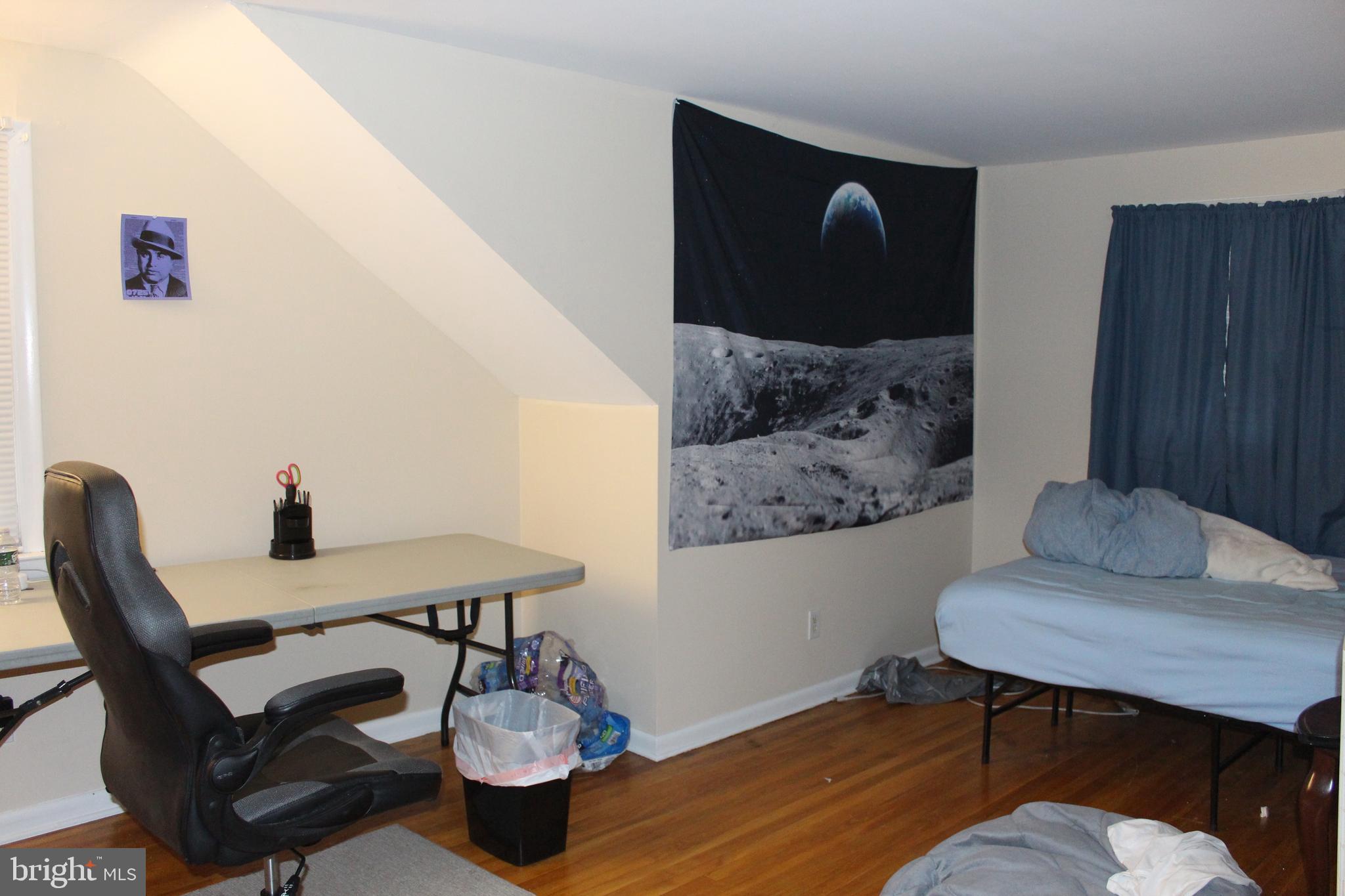 107 Laurel Avenue Glassboro, NJ 08028 - Photo 10 of 17 a workspace with furniture and window