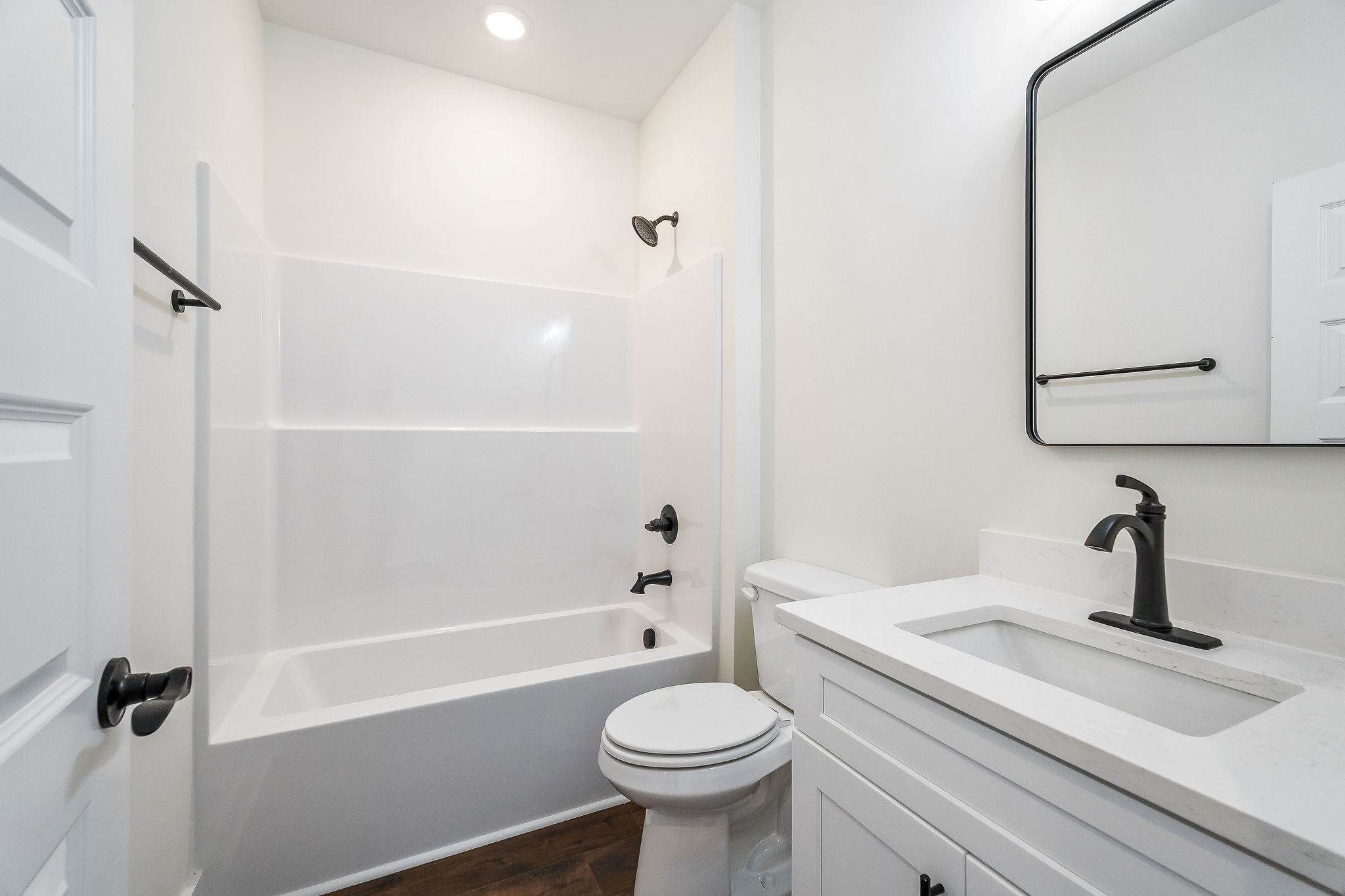 209 Brandon Drive McMinnville, TN 37110 - Photo 16 of 31 a bathroom with a sink a toilet and shower