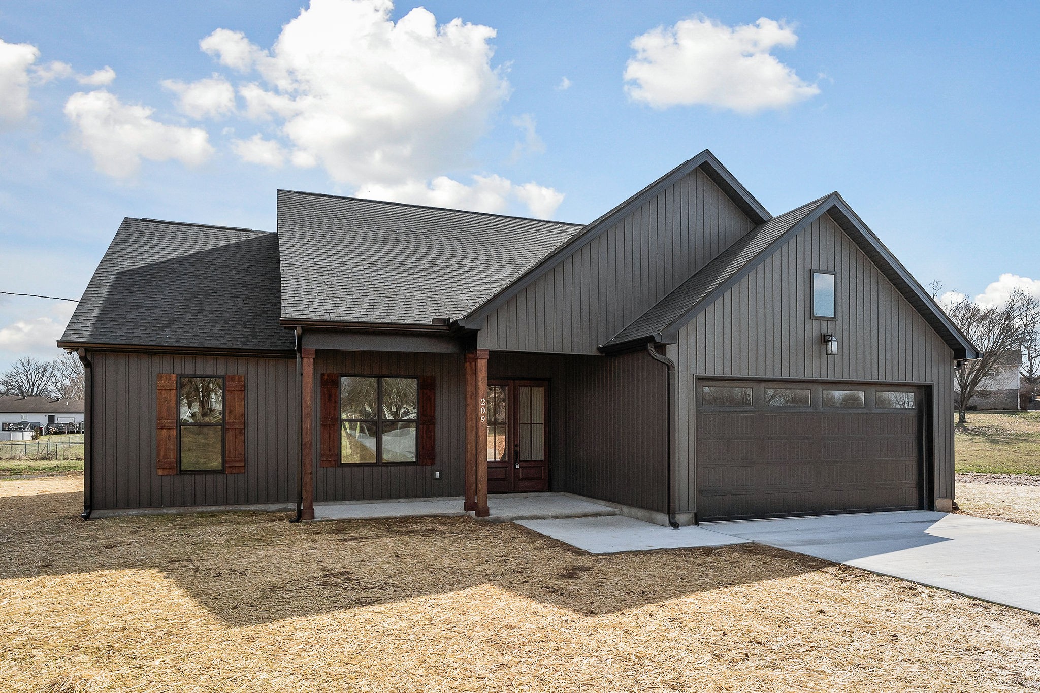 209 Brandon Drive McMinnville, TN 37110 - Photo 3 of 31 a front view of a house