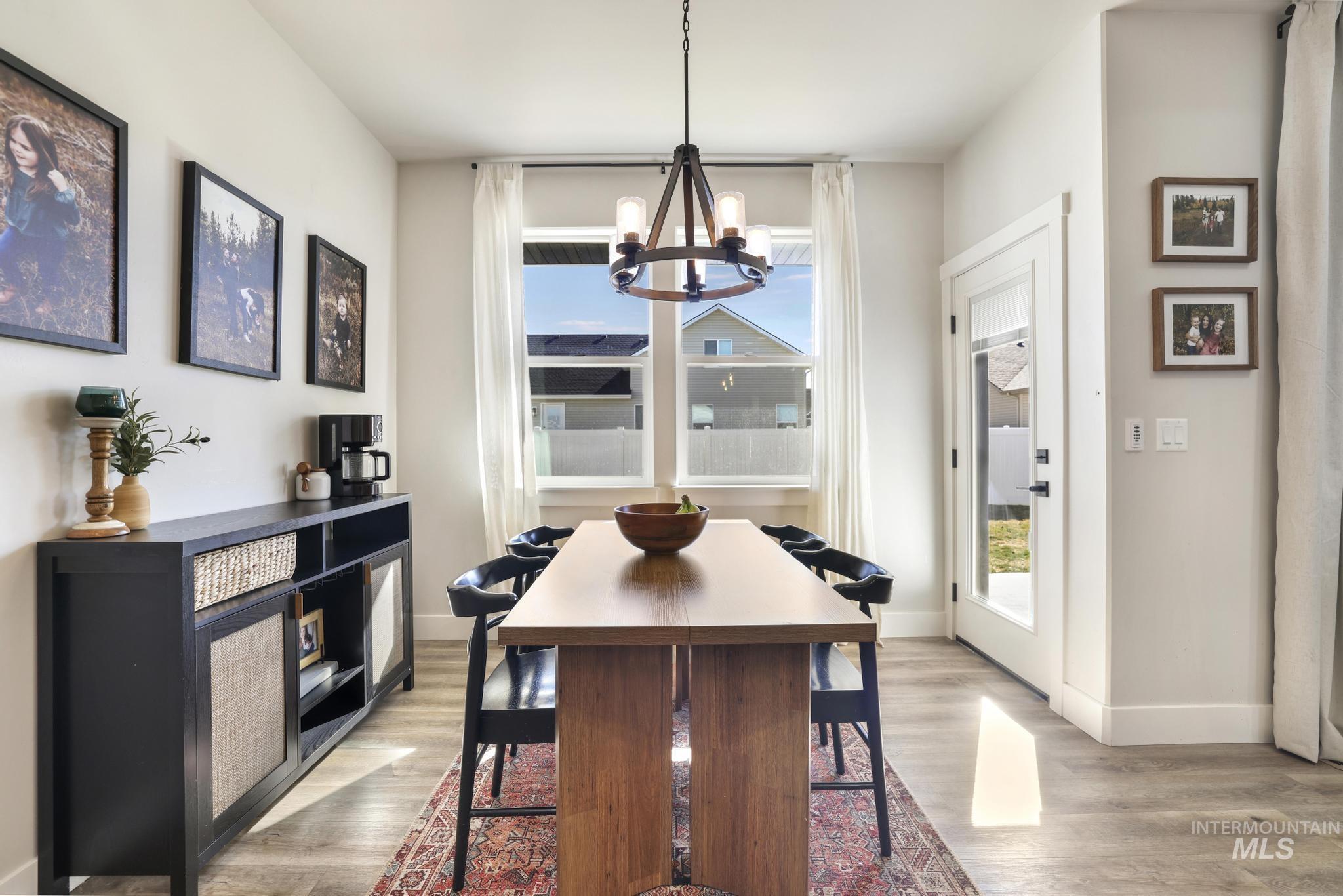1231 Frank Henry Road Twin Falls, ID 83301 - Photo 13 of 48 Dining area featuring hanging lights and light wood finished floors