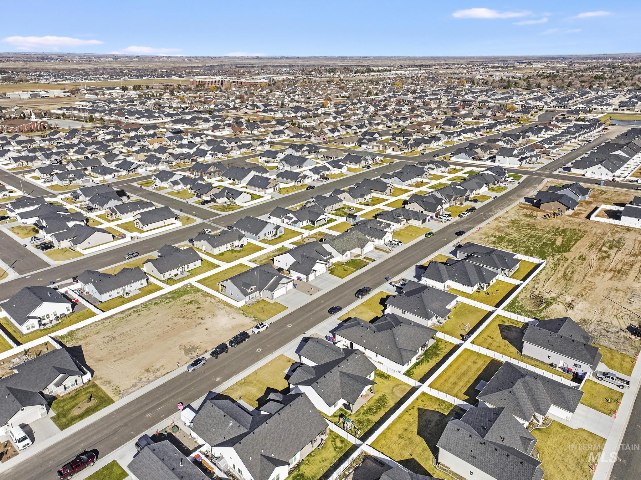 1231 Frank Henry Road Twin Falls, ID 83301 - Photo 40 of 48 Aerial view of property and surrounding area with nearby suburban area