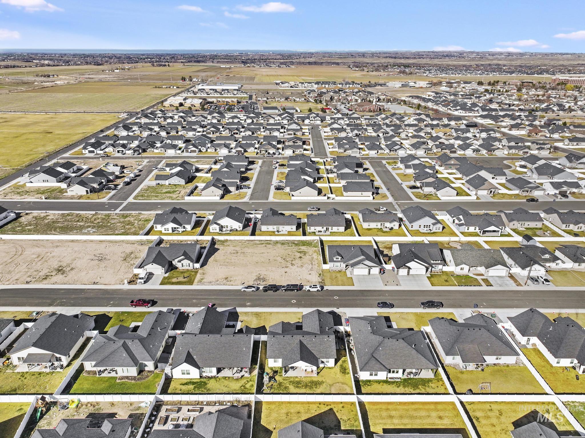 1231 Frank Henry Road Twin Falls, ID 83301 - Photo 41 of 48 Aerial view of property and surrounding area with nearby suburban area