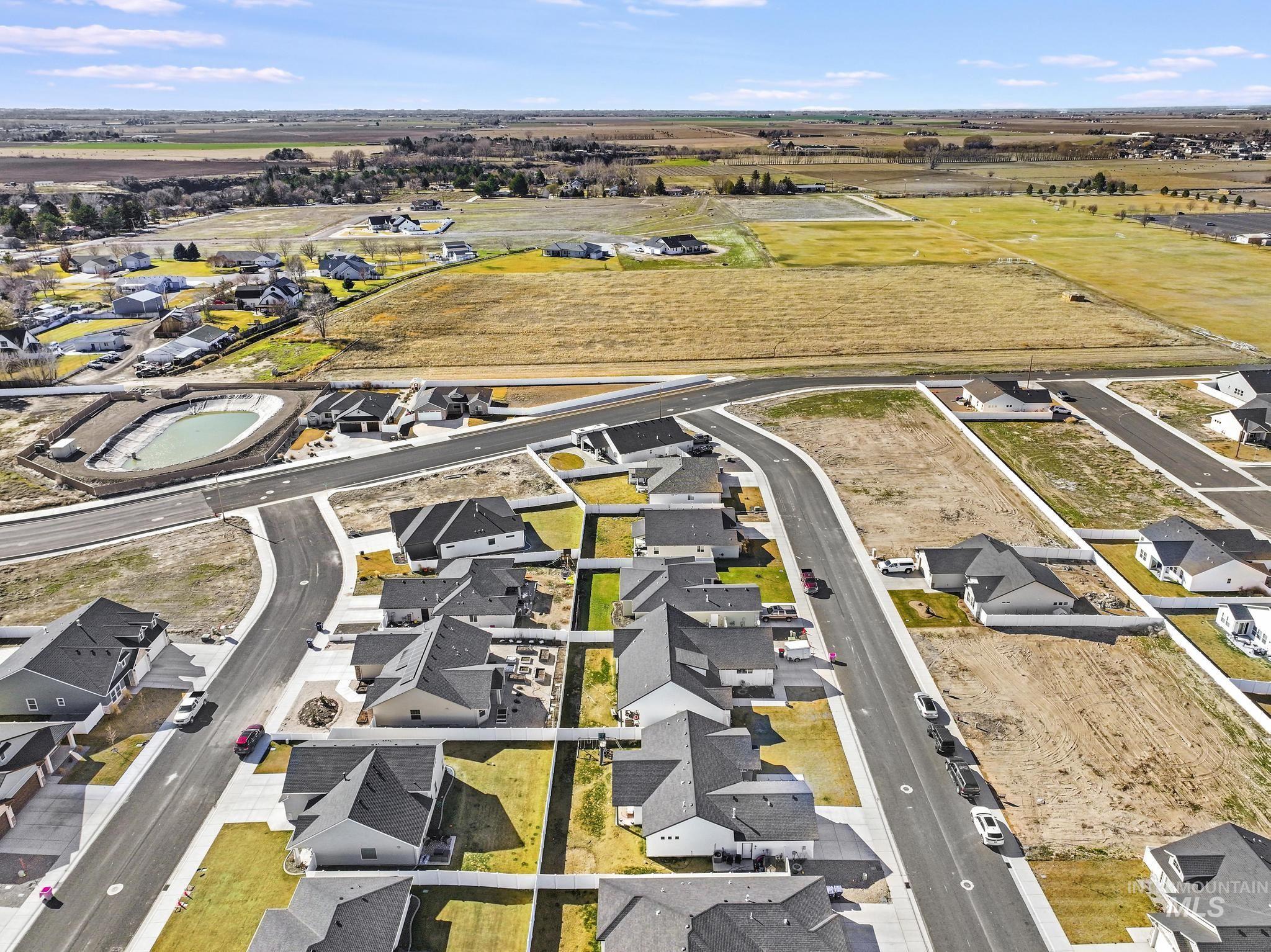 1231 Frank Henry Road Twin Falls, ID 83301 - Photo 42 of 48 Aerial view of property and surrounding area featuring nearby suburban area