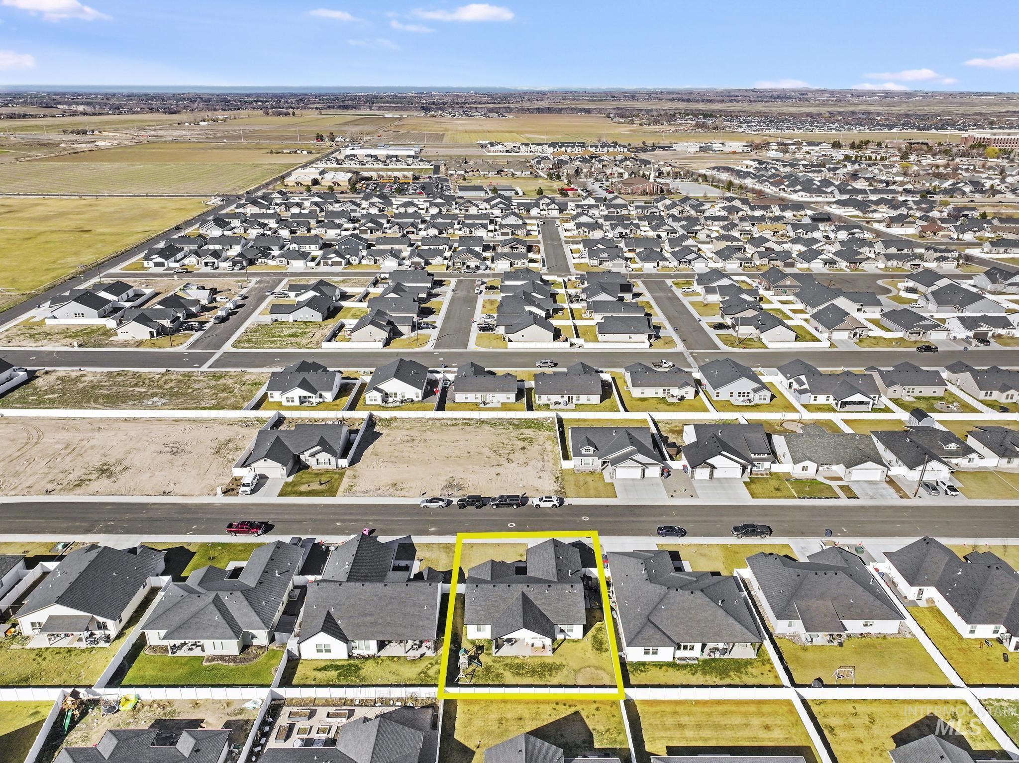 1231 Frank Henry Road Twin Falls, ID 83301 - Photo 43 of 48 Aerial view of property and surrounding area featuring nearby suburban area and property boundaries highlighted