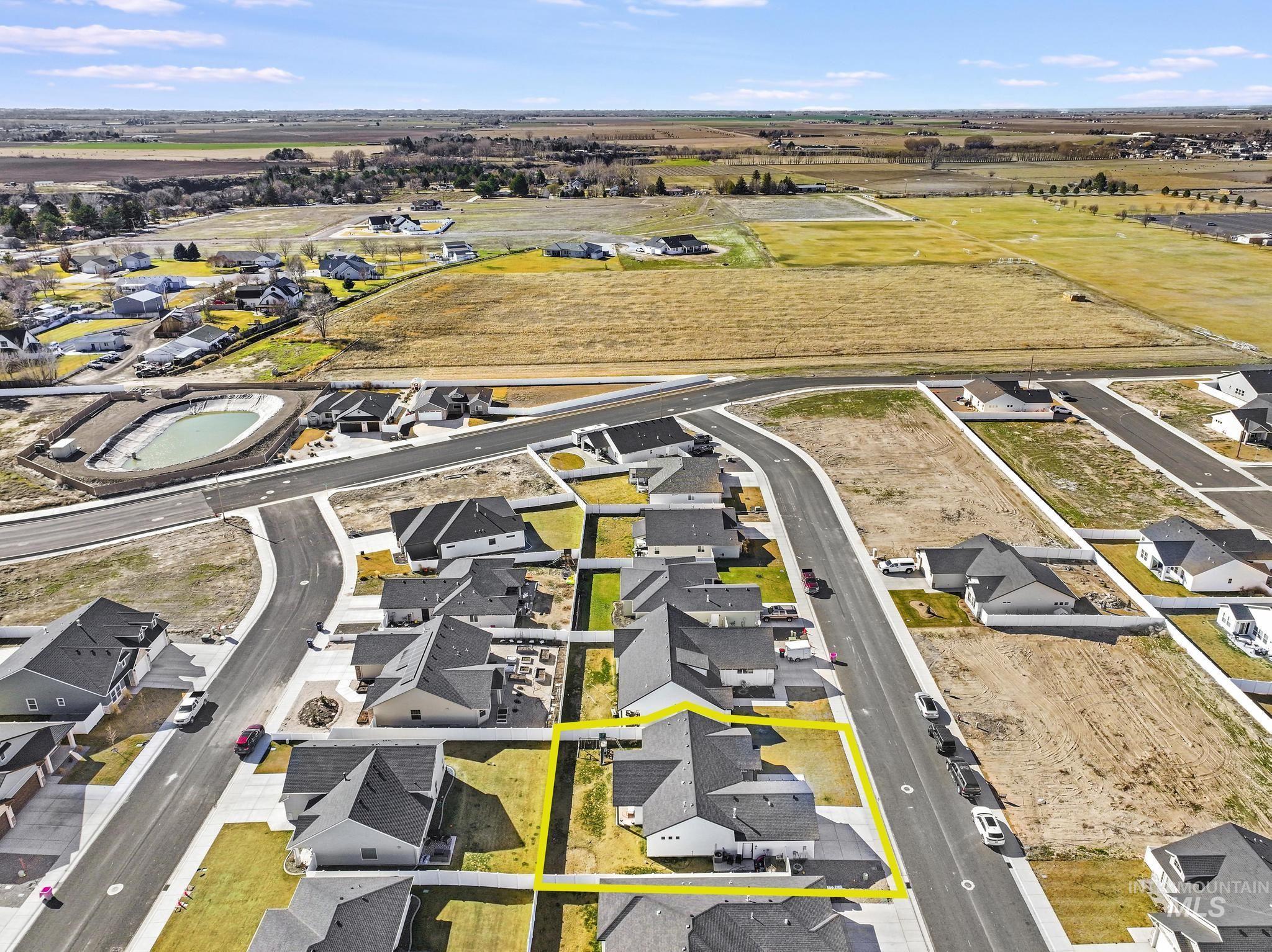 1231 Frank Henry Road Twin Falls, ID 83301 - Photo 47 of 48 Aerial view of property and surrounding area featuring nearby suburban area and property boundaries highlighted