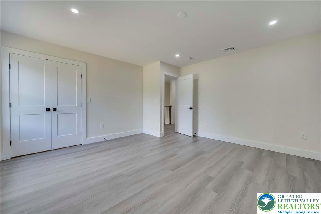 2840 Jacksonville Road Bethlehem, PA 18017 - Photo 26 of 29 a view of an empty room with wooden floor