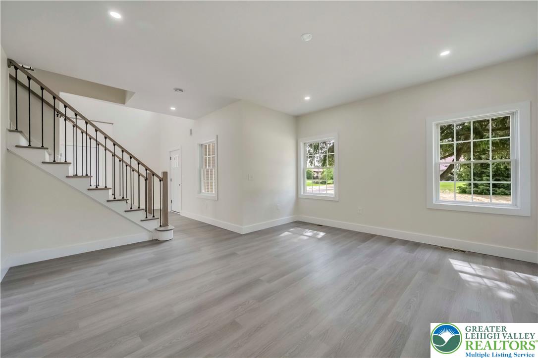 2840 Jacksonville Road Bethlehem, PA 18017 - Photo 6 of 29 a view of an empty room with wooden floor and a window