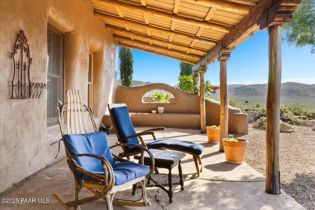 18300 Peacemaker Drive Dewey, AZ 86327 - Photo 11 of 47 a view of a patio with a table and chairs