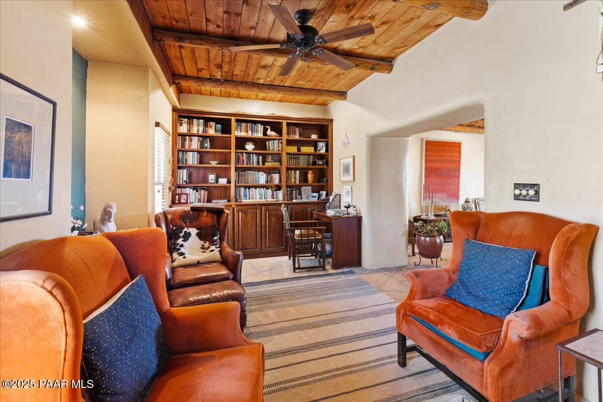 18300 Peacemaker Drive Dewey, AZ 86327 - Photo 29 of 47 a living room with furniture a ceiling fan and a rug