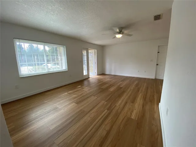 a view of an empty room and window
