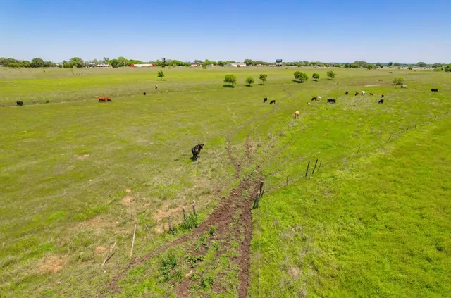 a view of a large body of water with lots of residential buildings and ocean view