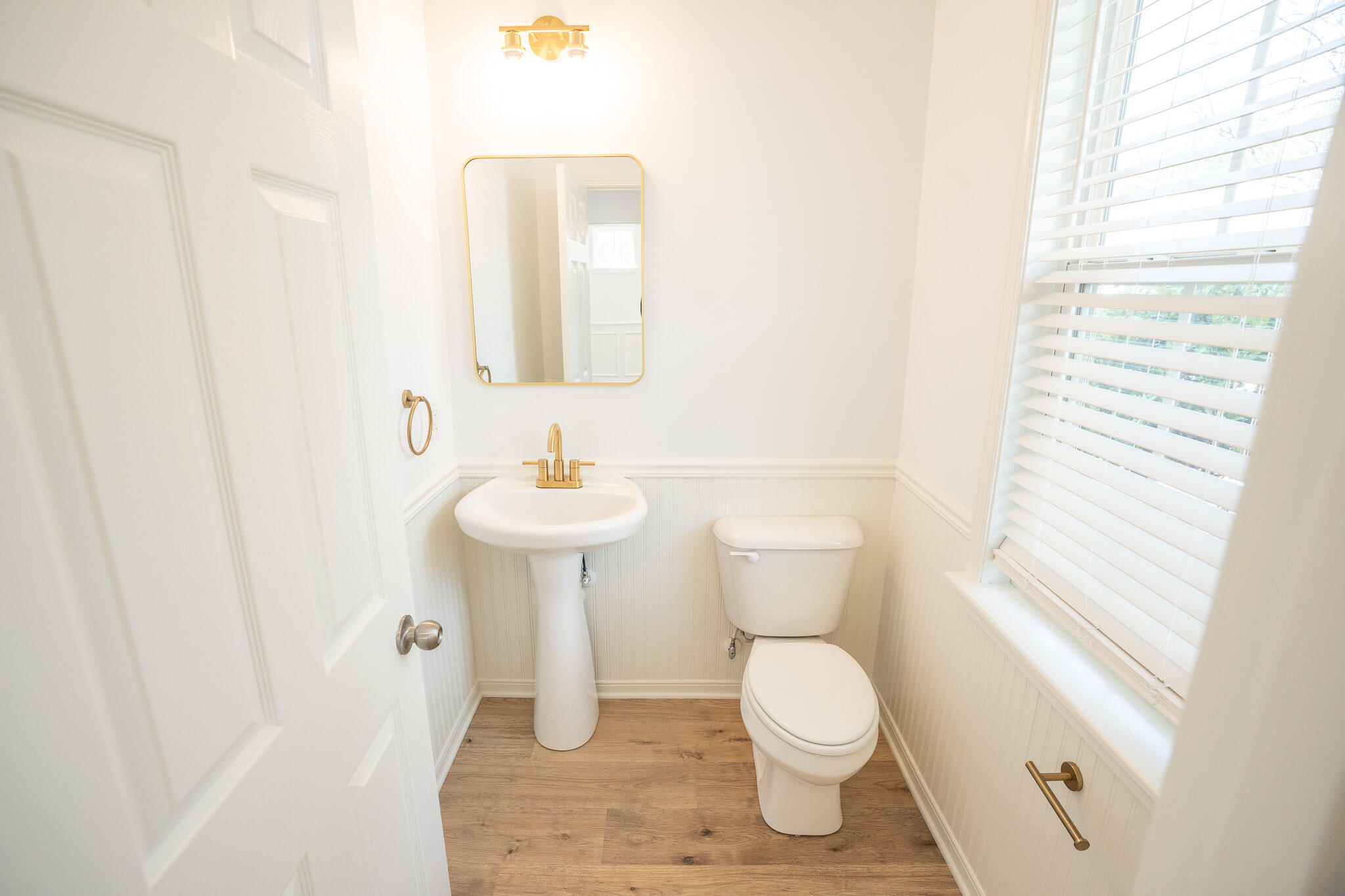 243 Cameron Street Summerville, SC 29486 - Photo 11 of 46 NEW HARWARE AND FLOORS IN POWDER BATH