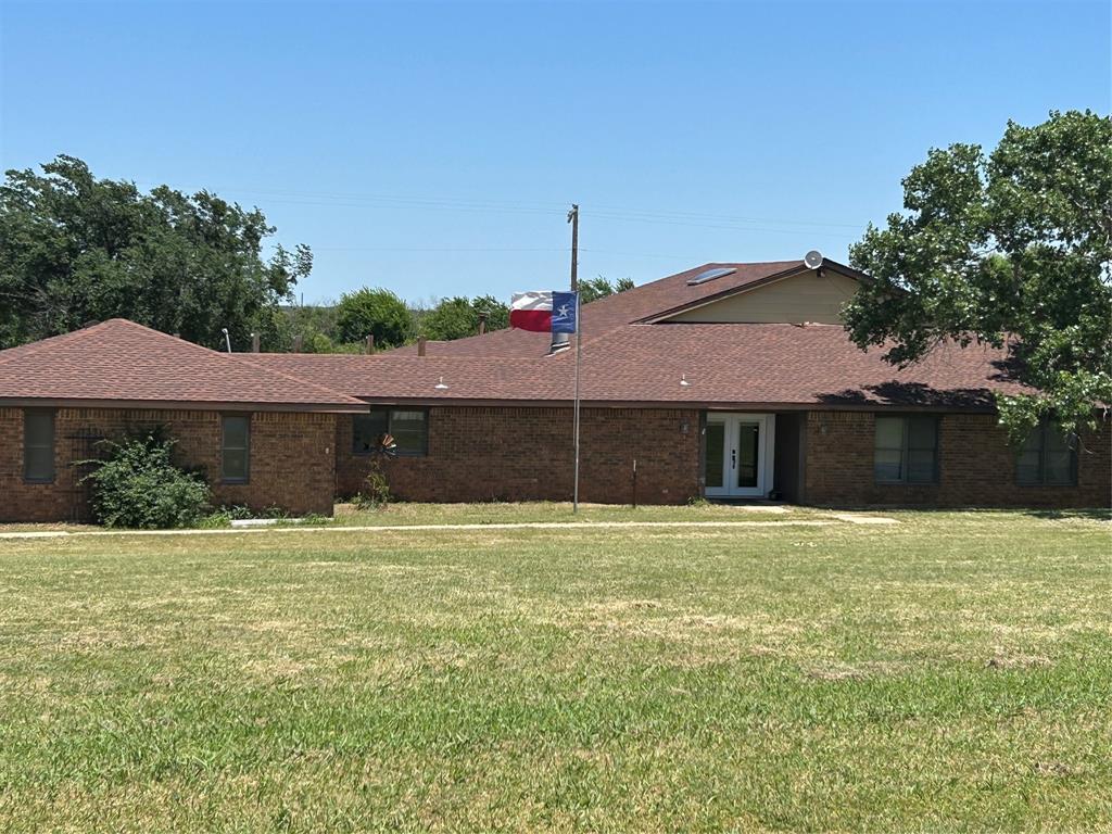 2020 Cedar Street Megargel, TX 76374 - Photo 2 of 29 a front view of a house with a yard