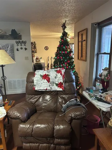 a living room with furniture and a couch