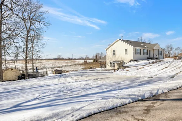 a view of a terrace with wooden floor and city view