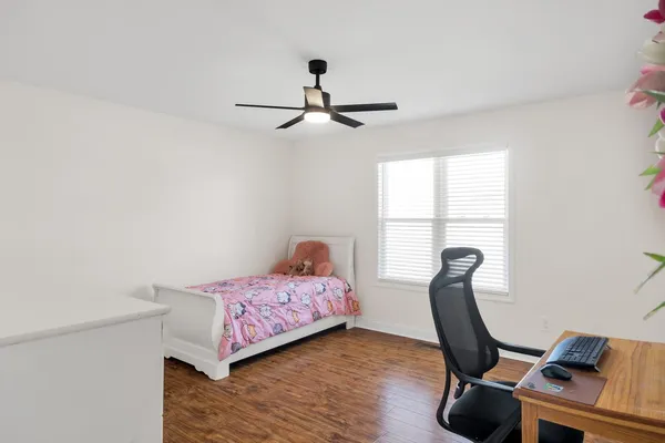 a view of a workspace with furniture