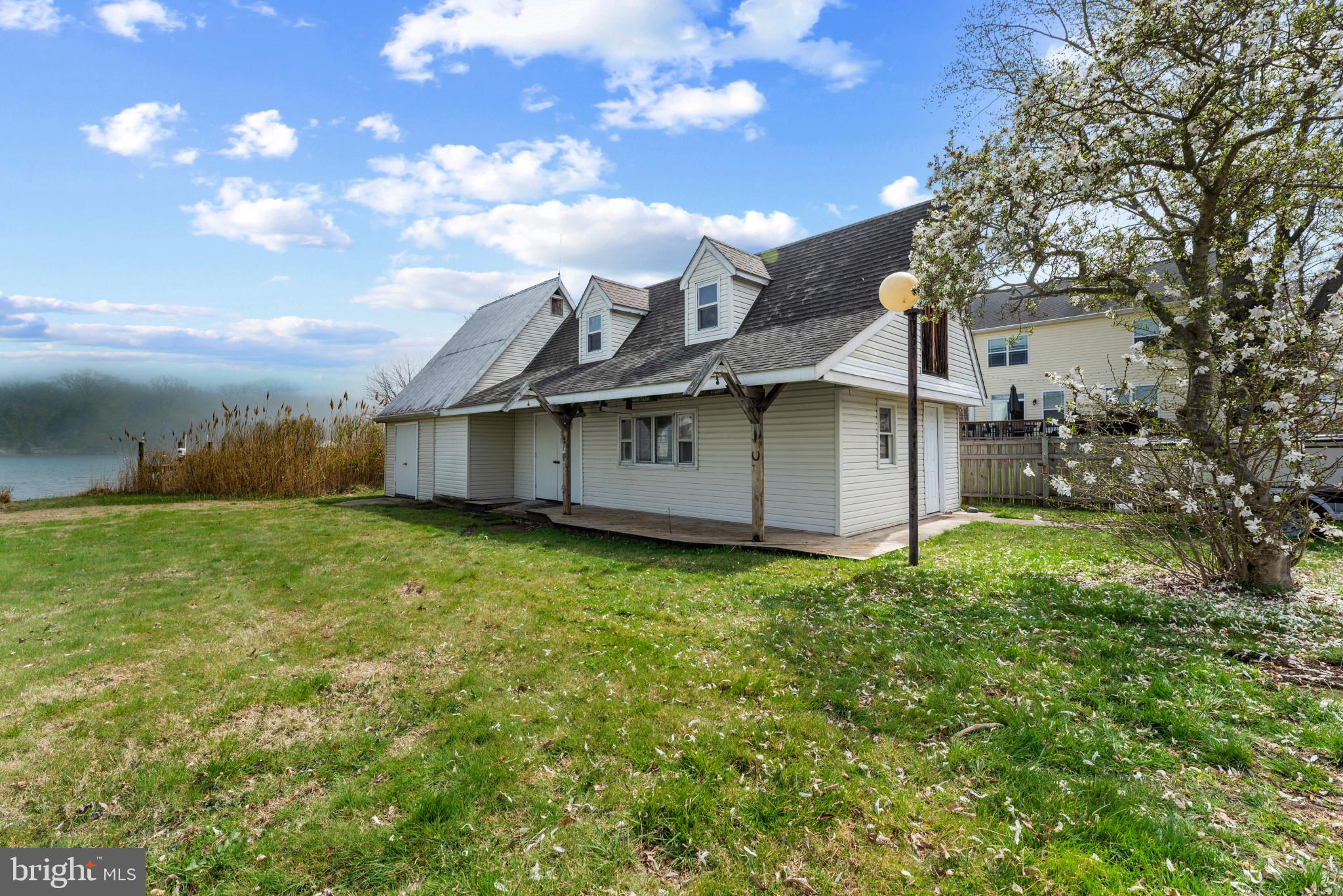 5929 Deale Beach Road Deale, MD 20751 - Photo 46 of 58 View of home's exterior featuring roof with shingl