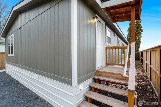 a view of a balcony with wooden floor
