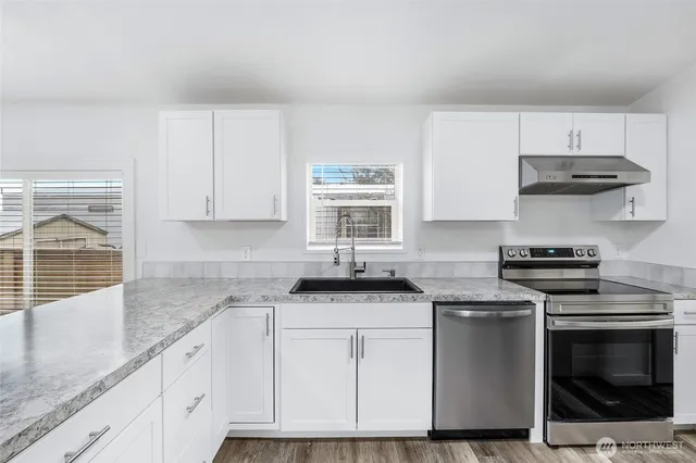 an empty room with windows