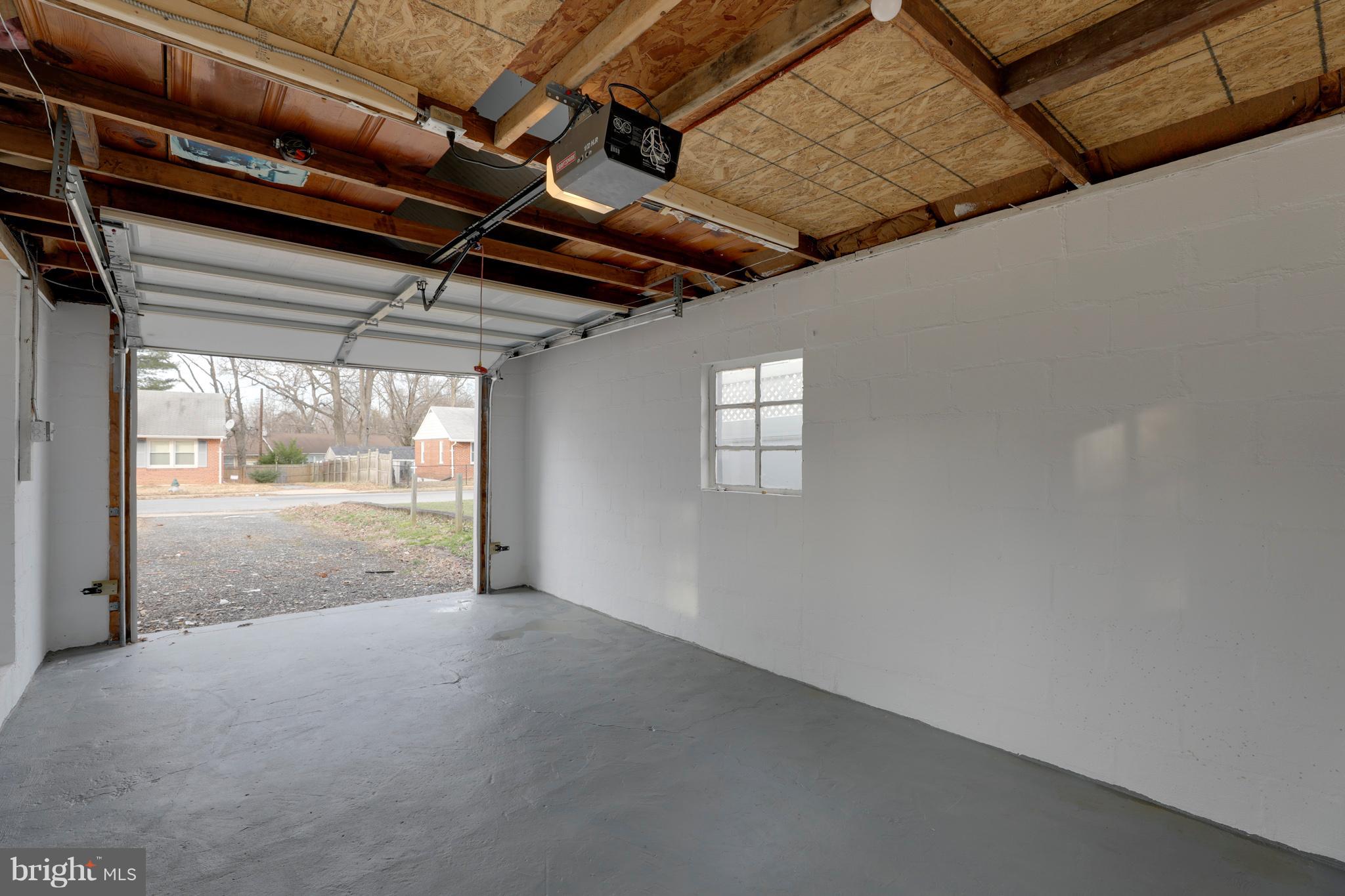 6203 Woodley Road Clinton, MD 20735 - Photo 13 of 38 a view of a room with wooden walls
