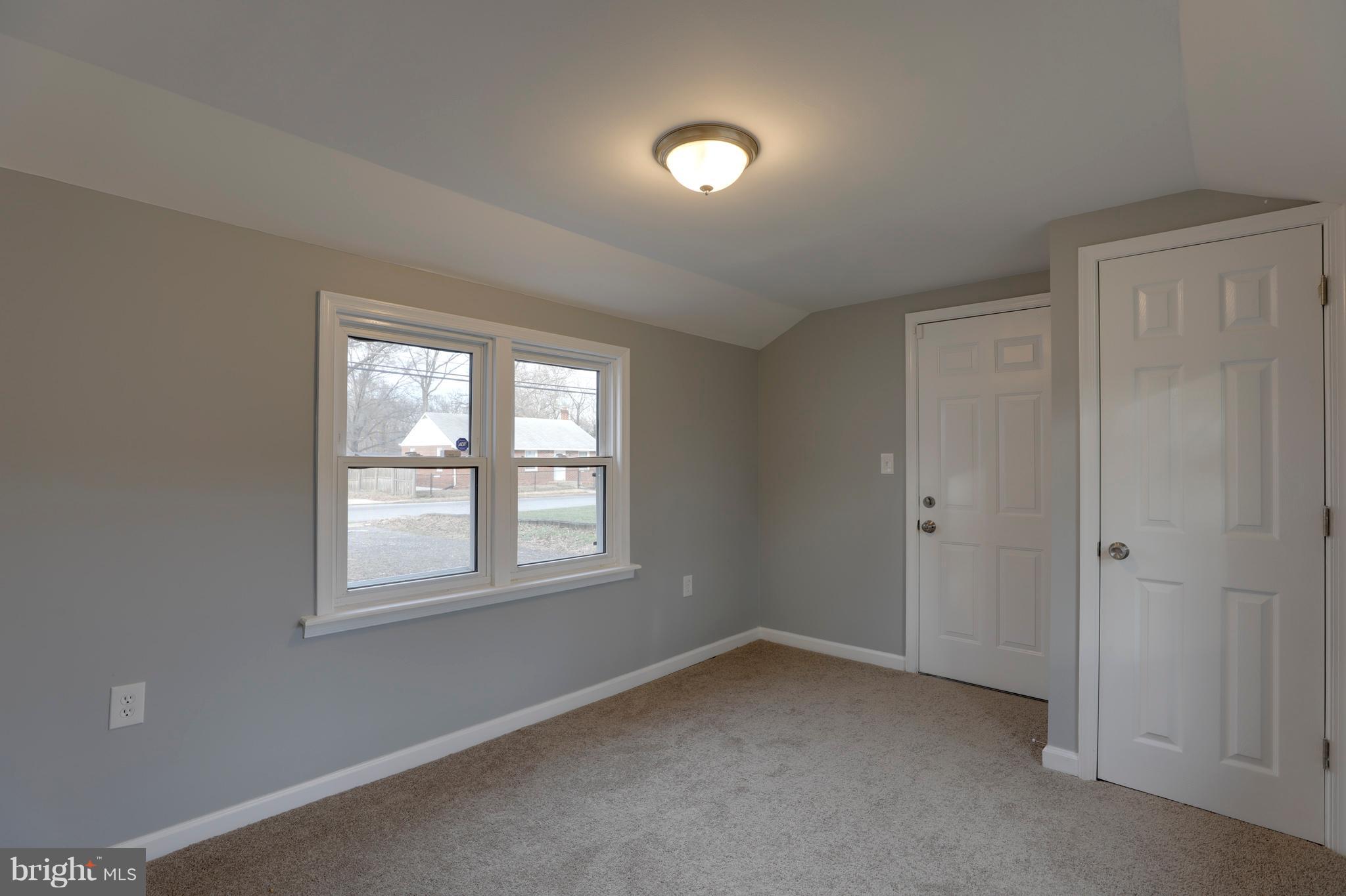 6203 Woodley Road Clinton, MD 20735 - Photo 23 of 38 a view of empty room with windows