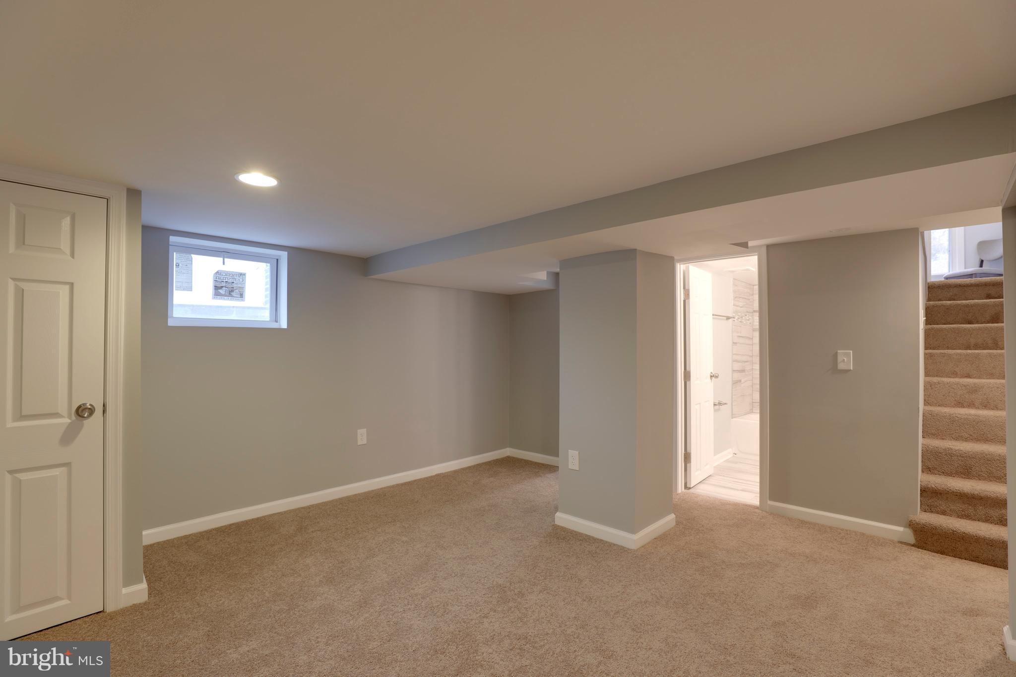 6203 Woodley Road Clinton, MD 20735 - Photo 29 of 38 a view of an empty room with a window