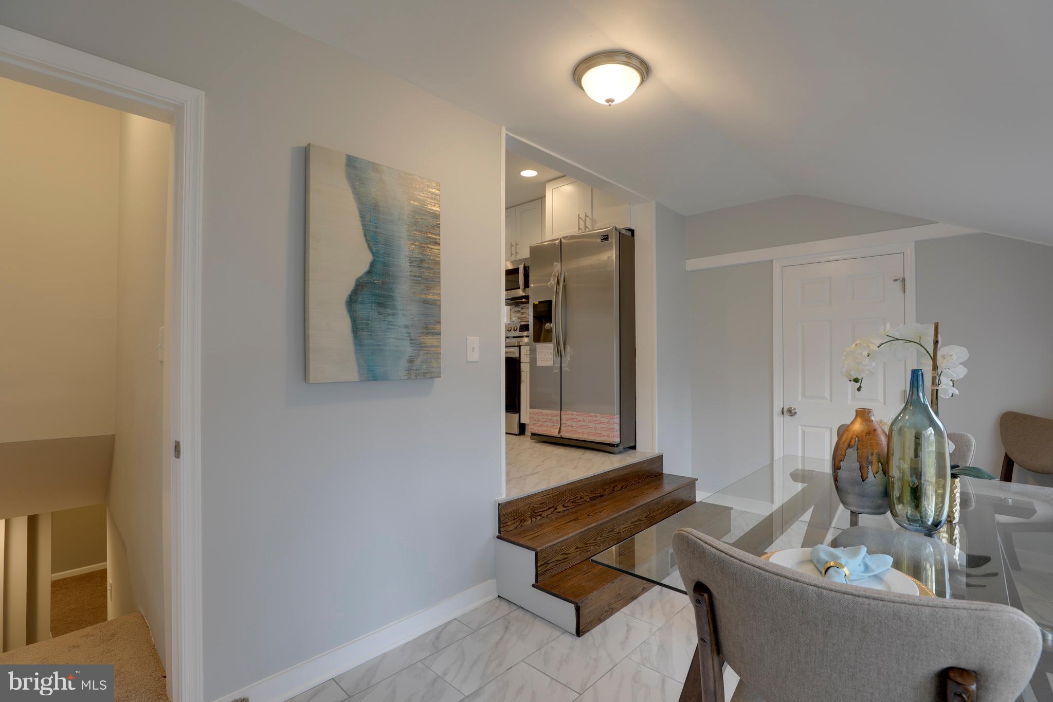 6203 Woodley Road Clinton, MD 20735 - Photo 10 of 38 a room with furniture and mirror