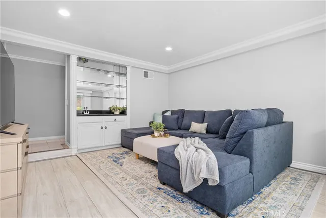 a living room with furniture and view of living room