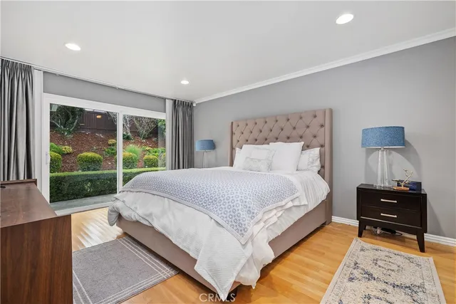 a bed room with a bed and a window