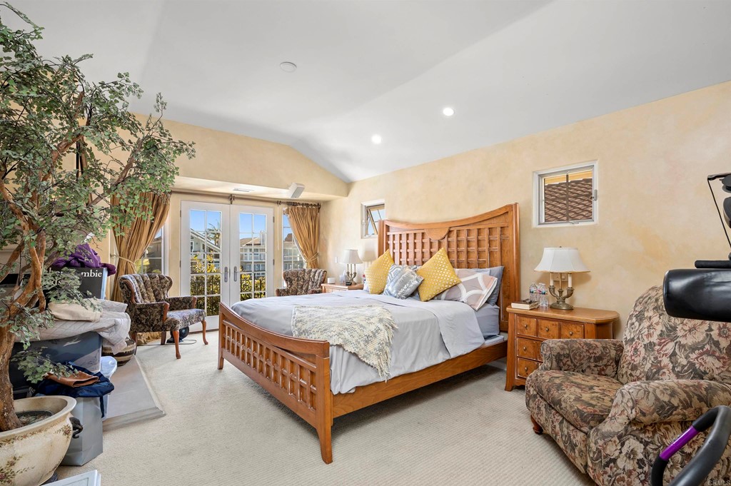 42 Blue Anchor Cay Road Coronado, CA 92118 - Photo 20 of 38 a bedroom with bed and a couch