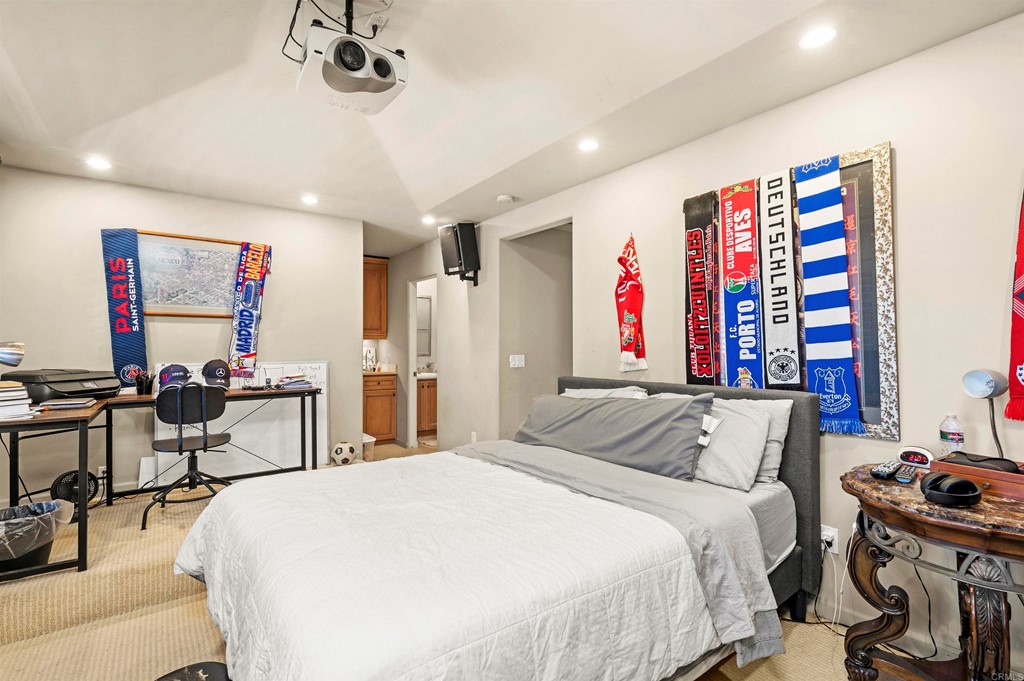 42 Blue Anchor Cay Road Coronado, CA 92118 - Photo 29 of 38 a bedroom with a bed and a table