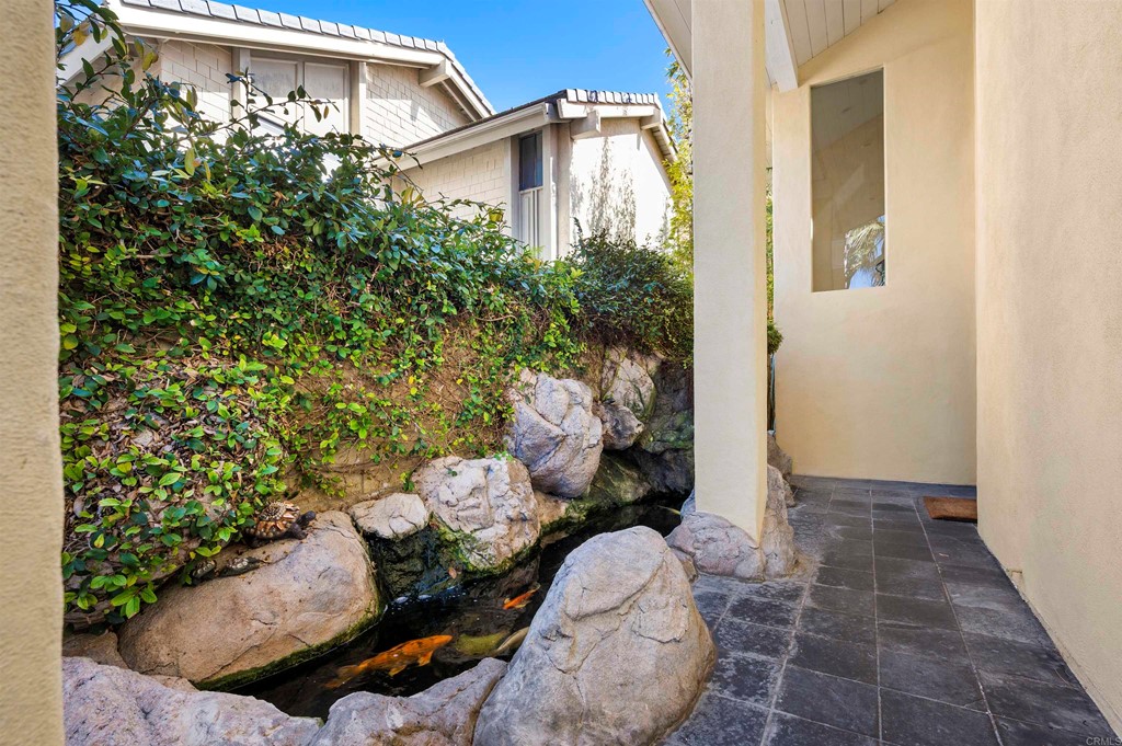 42 Blue Anchor Cay Road Coronado, CA 92118 - Photo 5 of 38 view of backyard with outdoor seating