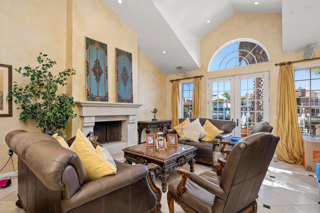 42 Blue Anchor Cay Road Coronado, CA 92118 - Photo 7 of 38 a living room with furniture and a fireplace