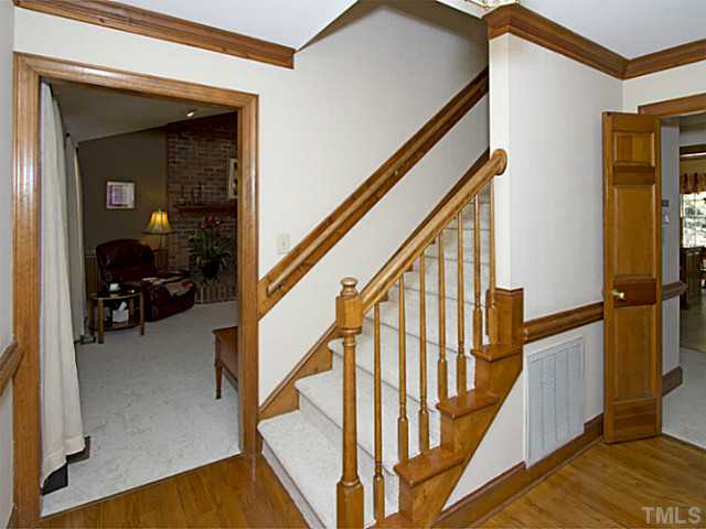 2812 Halfhitch Trail Raleigh, NC 27615 - Photo 2 of 23 Notice chair rail and crown molding and hardwoods.