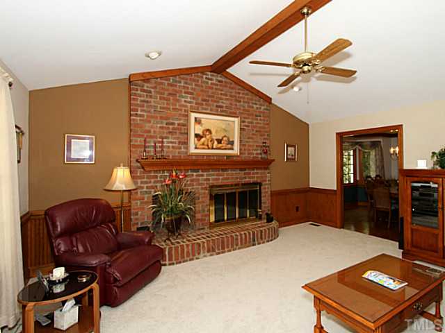 2812 Halfhitch Trail Raleigh, NC 27615 - Photo 3 of 23 Vaulted with ceiling fan. Masonry fireplace with wood box and gas logs.